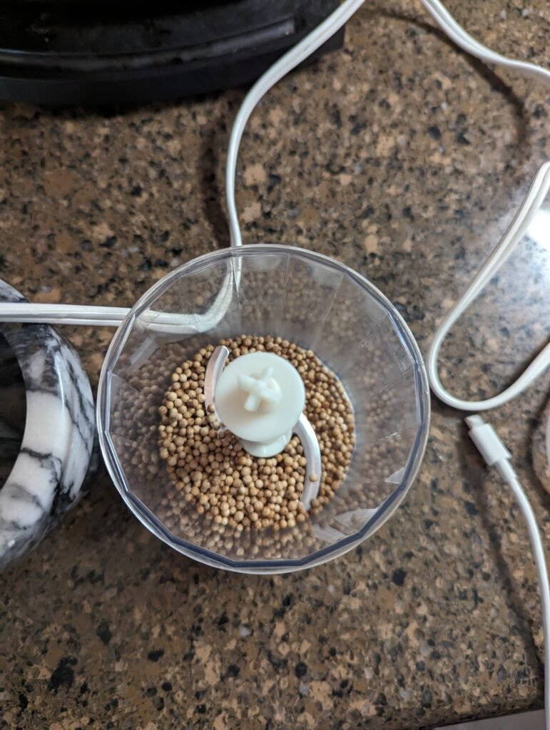 Coriander in spice grinder